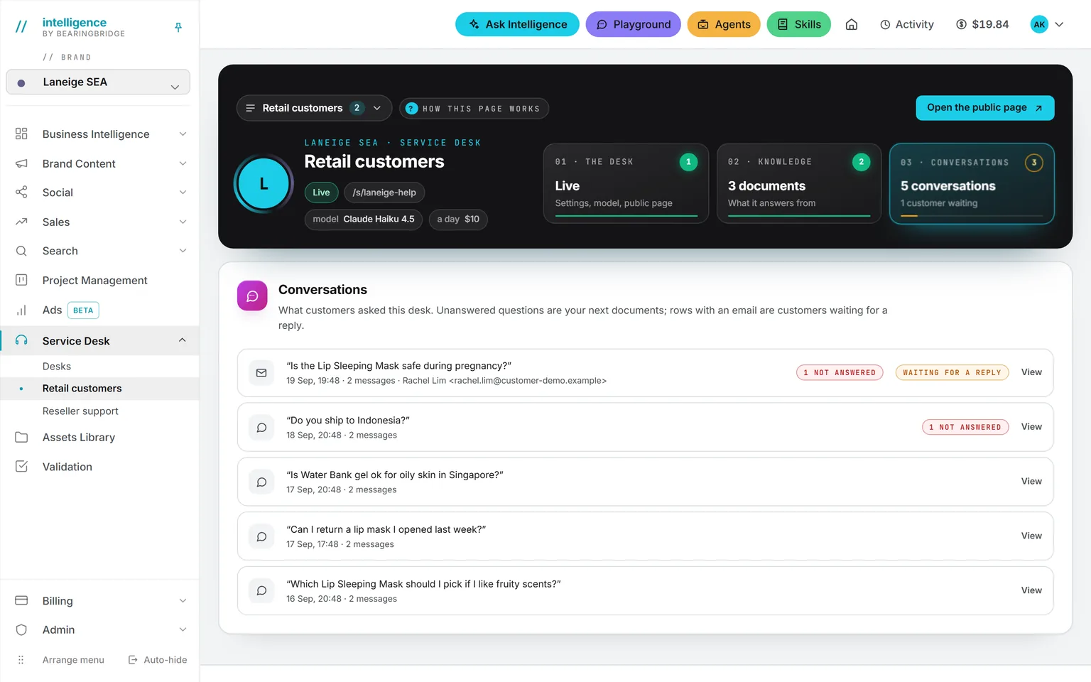 The Conversations tab of a desk: five questions customers asked, two marked not answered, and one waiting for a reply with the address the customer left